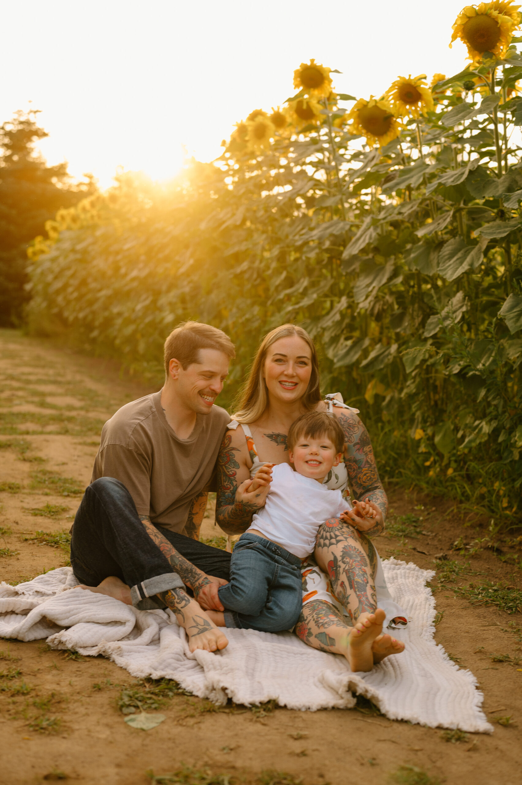 Family Photos in sunflowers by Vancouver Washington Family Photographer Forgette Photo. 