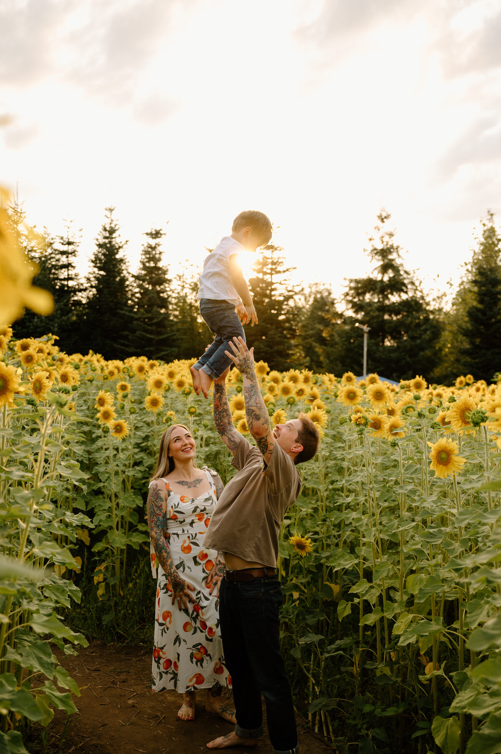 Family in sunflowers taken by Vancouver Washington Family Photographer. 