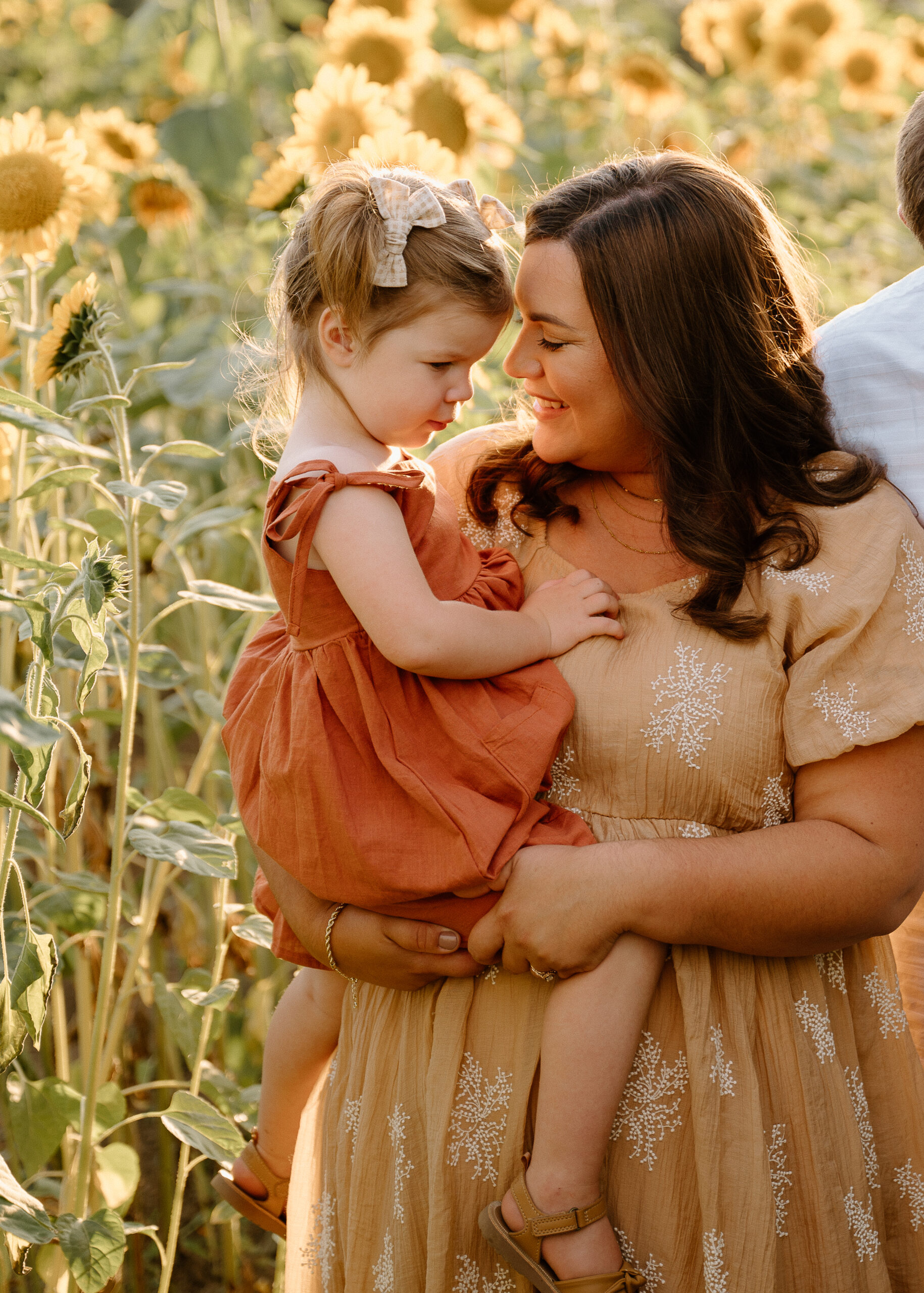 Mom and daughter in sunflowers by family photographer Forgette Photo
