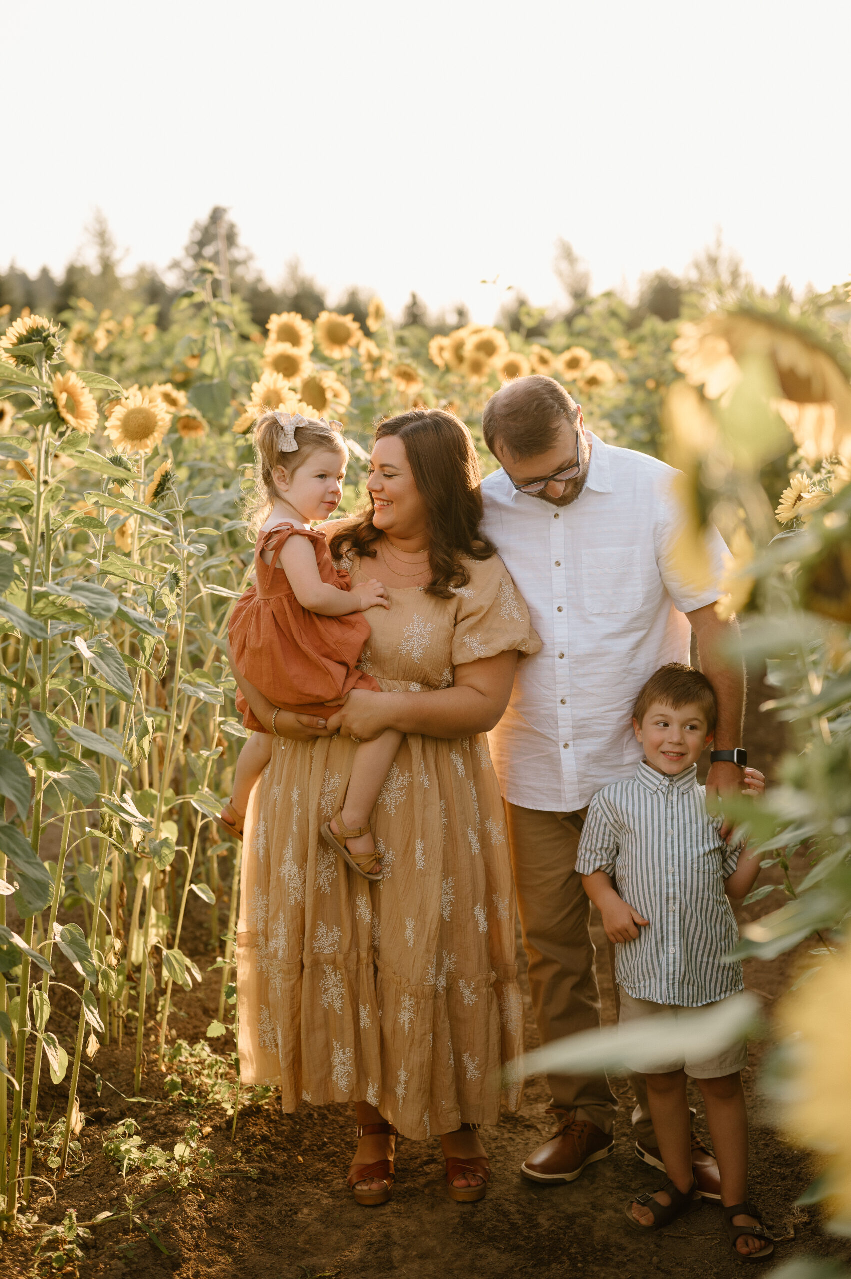 Family photo in sunflowers by Vancouver, Washington family photographer. 