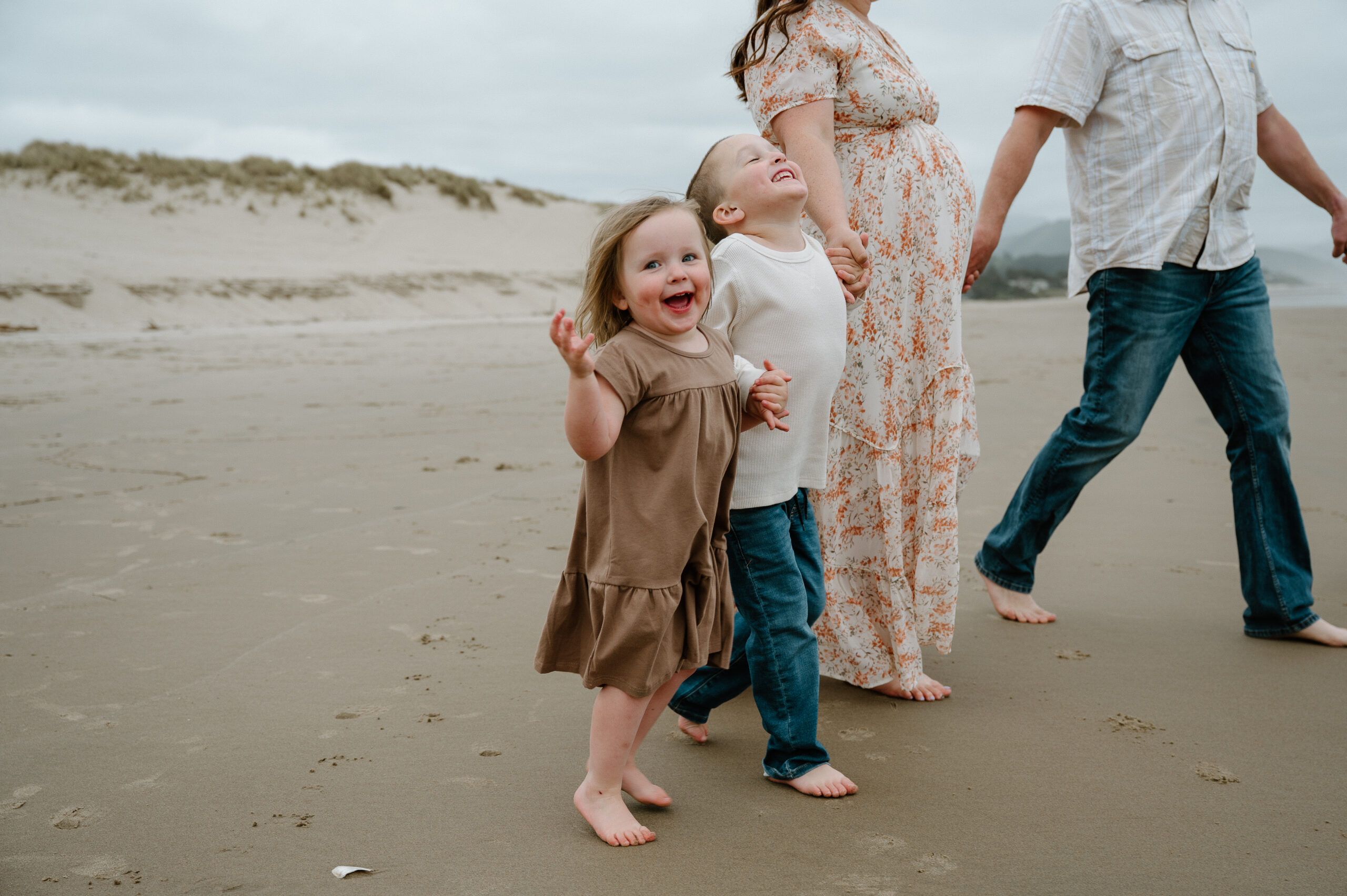 Family portrait on beach by Vancouver, Washington family photographer. 