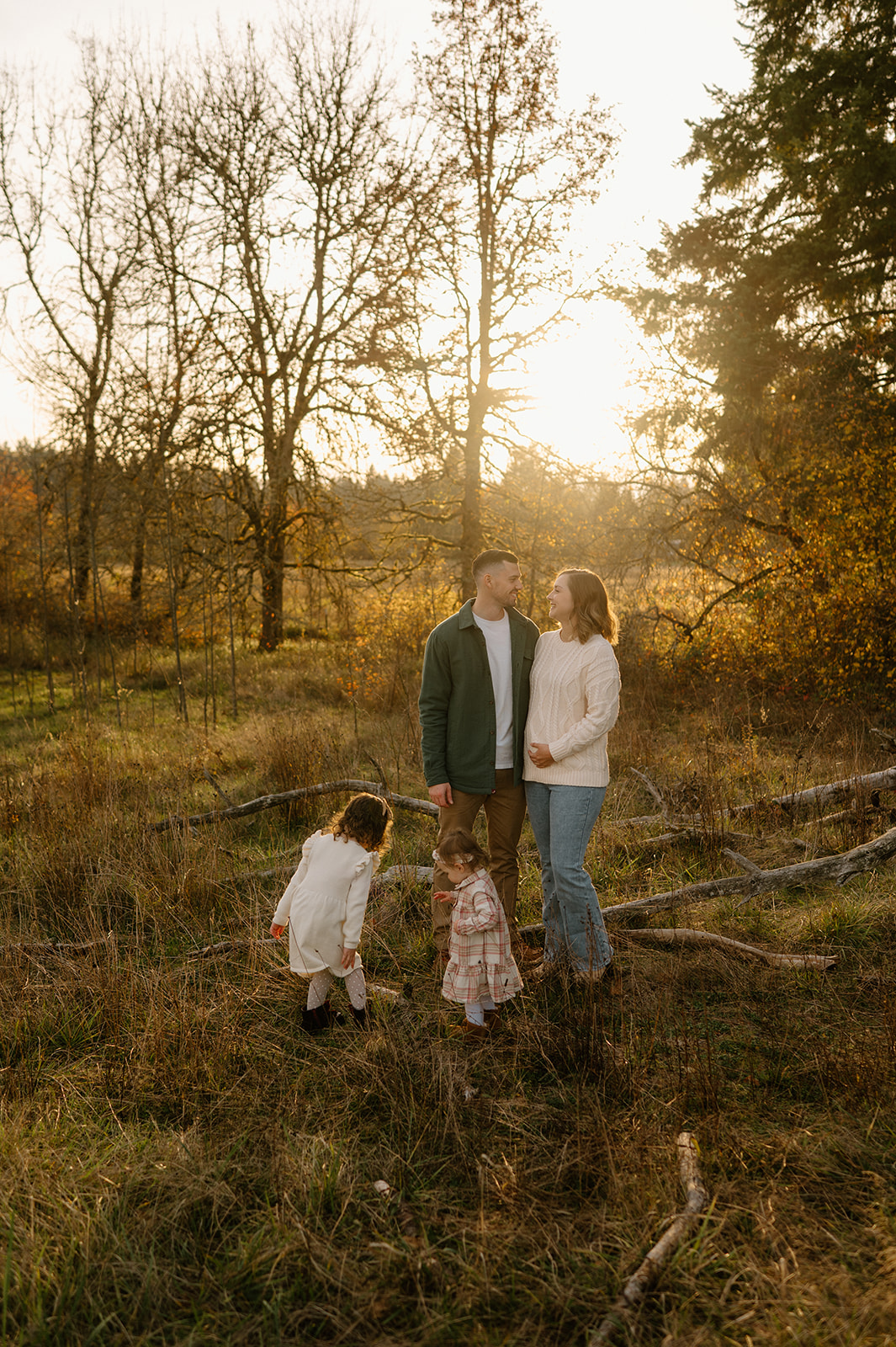 Fall family photo in trees taken by Vancouver, Washington family photographer.